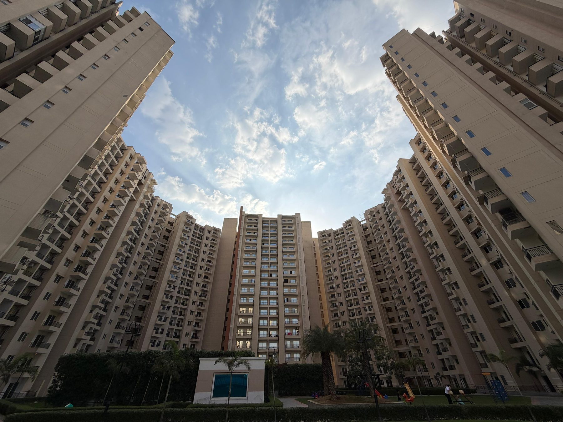 Oasis Grandstand by Oasis Group — towers and central courtyard